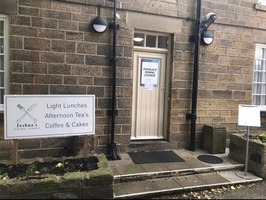 Cooper Gallery Back Entrance - Joshua's Dining Lounge. A cafe serving light lunches, afternoon teas, coffee an cakes.