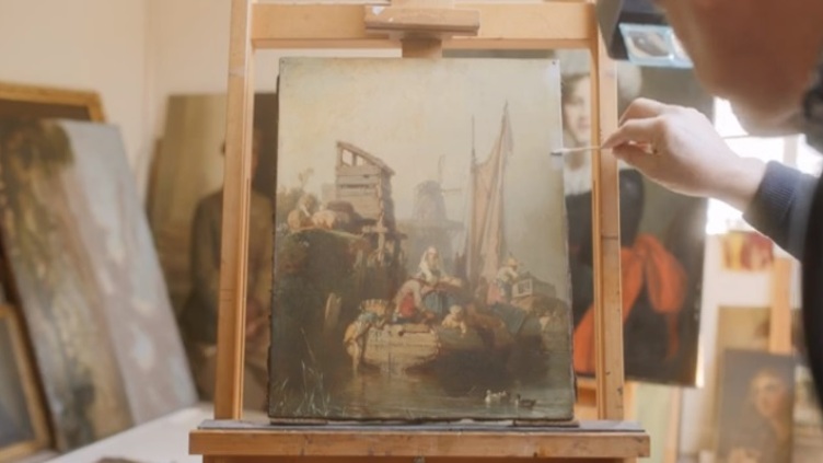 A painting in the process of being conserved
